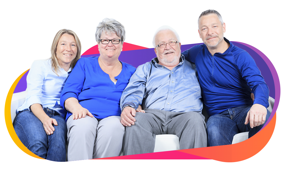 Happy family seating on a couch after a hoarder cleaning service